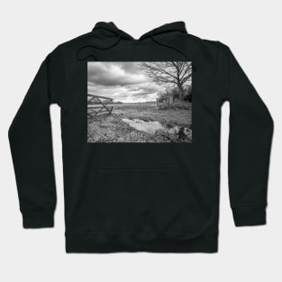 Wooden gate showing the entrance to an arable field in the English countryside Hoodie